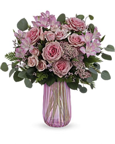 <div id="mark-3" class="m-pdp-tabs-marketing-description">
<div id="mark-3" class="m-pdp-tabs-marketing-description">This Mother's Day…think pink! Beautiful pink roses in a shimmering, iridescent pink glass vase that Mom is sure to love.</div>
<p>&nbsp;</p>
<div id="desc-3">Pink roses, pink spray roses, pink alstroemeria and pink rice flower are arranged with leatherleaf fern, pink limonium and silver dollar eucalyptus.</div>
</div>