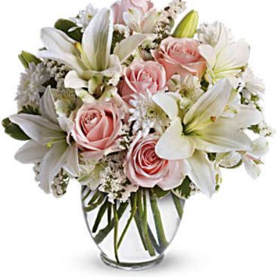 <div id="mark-3" class="m-pdp-tabs-marketing-description">Express your love with the eloquence of Shakespeare - without saying a word. She'll adore this exquisite bouquet of roses and lilies and other pastel favorites in a classic ginger vase. And she'll know just the words to let you know.</div>
<div id="desc-3">
<ul>
<li>Light pink roses, white asiatic lilies, white alstroemeria and white cushion spray chrysanthemums are mixed with white statice and variegated pittosporum in a clear, rounded vase.</li>
</ul>
</div>