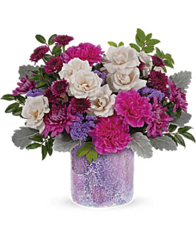 <div id="mark-3" class="m-pdp-tabs-marketing-description">
<div id="mark-3" class="m-pdp-tabs-marketing-description">Go for the glam this Mother's Day with a gift that sparkles as brightly as she does--a breathtaking rose bouquet in a vibrant mosaic glass keepsake vase.</div>
<p>&nbsp;</p>
<div id="desc-3">This bouquet includes crème spray roses, purple button spray chrysanthemums, hot pink carnations, purple cushion spray chrysanthemums, lavender sinuata statice, dusty miller and huckleberry.</div>
</div>