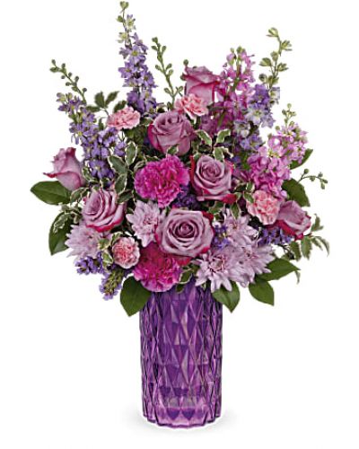 <div id="mark-3" class="m-pdp-tabs-marketing-description">Lavish mom with luxury! This magnificent lavender rose bouquet reaches new heights of glamour in a stunning diamond-cut, amethyst-hued vase.</div>
<p>&nbsp;</p>
<div id="desc-3">This amazing bouquet includes lavender roses, purple larkspur, pink stock, purple carnations, lavender cushion spray chrysanthemums, miniature pink carnations, purple sinuata statice, lemon leaf and pitta negra. Delivered in Teleflora's Amazing Amethyst vase.</div>