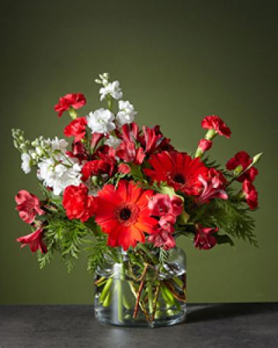 <div class="row">
<div class="truncated">
<p>The Big Red Bow bouquet will add the perfect finishing touch to any room's holiday décor. Let the cherry red gerbera daises steal the show while the white stock adds balance and softens the vibrant arrangement.
</p></div>
</div>
<div id="accordion-container" class="product-detail-step-one product-page">
<div id="accordion" class="panel-group">
<div class="panel panel-default">
<div class="panel-heading">
<h4 class="panel-title"></h4>
</div>
</div>
</div>
</div>