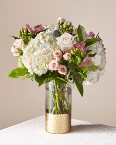 <p>Give the gift of freshness with a vase full of Rosé All Day. This blush beauty brings elegant excitement to end tables and entryways alike with its selection of roses, hydrangea, spray roses, and more.</p>