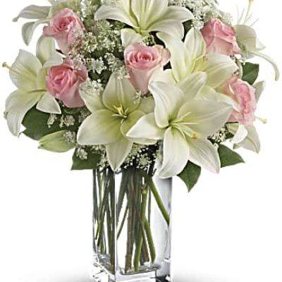 <div id="mark-3" class="m-pdp-tabs-marketing-description">Stunning in its simplicity, this innocent harmony of light pink roses and snow white lilies are a heartfelt way to send your very best. The classic, clear rectangular glass vase keeps the focus on the heavenly beauty of the blooms.</div>
<div id="desc-3">
<ul>
<li>Light pink roses and white asiatic lilies form a fragrant bouquet with delicate touches of Queen Anne's lace and rich green salal.</li>
</ul>
</div>