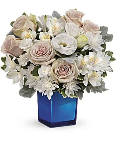 <div id="mark-3" class="m-pdp-tabs-marketing-description">Bursting with gorgeous roses and blooms, this cobalt glass cube vase is a gorgeous gift that can also serve as a beautiful candleholder!</div>
<p>&nbsp;</p>
<div id="desc-3">This splendid bouquet features crème roses, white cushion spray chrysanthemums, white lisianthus, white alstroemeria, miniature white carnations, dusty miller and variegated pittosporum.</div>