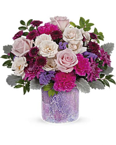 <div id="mark-3" class="m-pdp-tabs-marketing-description">Go for the glam this Mother's Day with a gift that sparkles as brightly as she does--a breathtaking rose bouquet in a vibrant mosaic glass keepsake vase.</div>
<p>&nbsp;</p>
<div id="desc-3">This bouquet includes crème spray roses, purple button spray chrysanthemums, hot pink carnations, purple cushion spray chrysanthemums, lavender sinuata statice, dusty miller and huckleberry.</div>